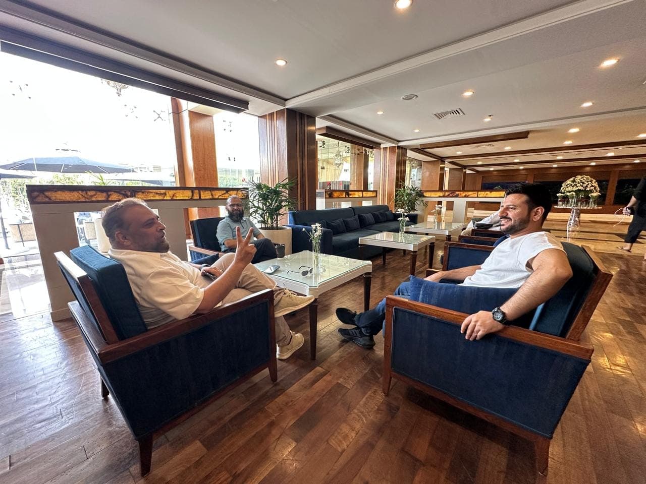 Pragmatic Solutions team meeting in a client lounge