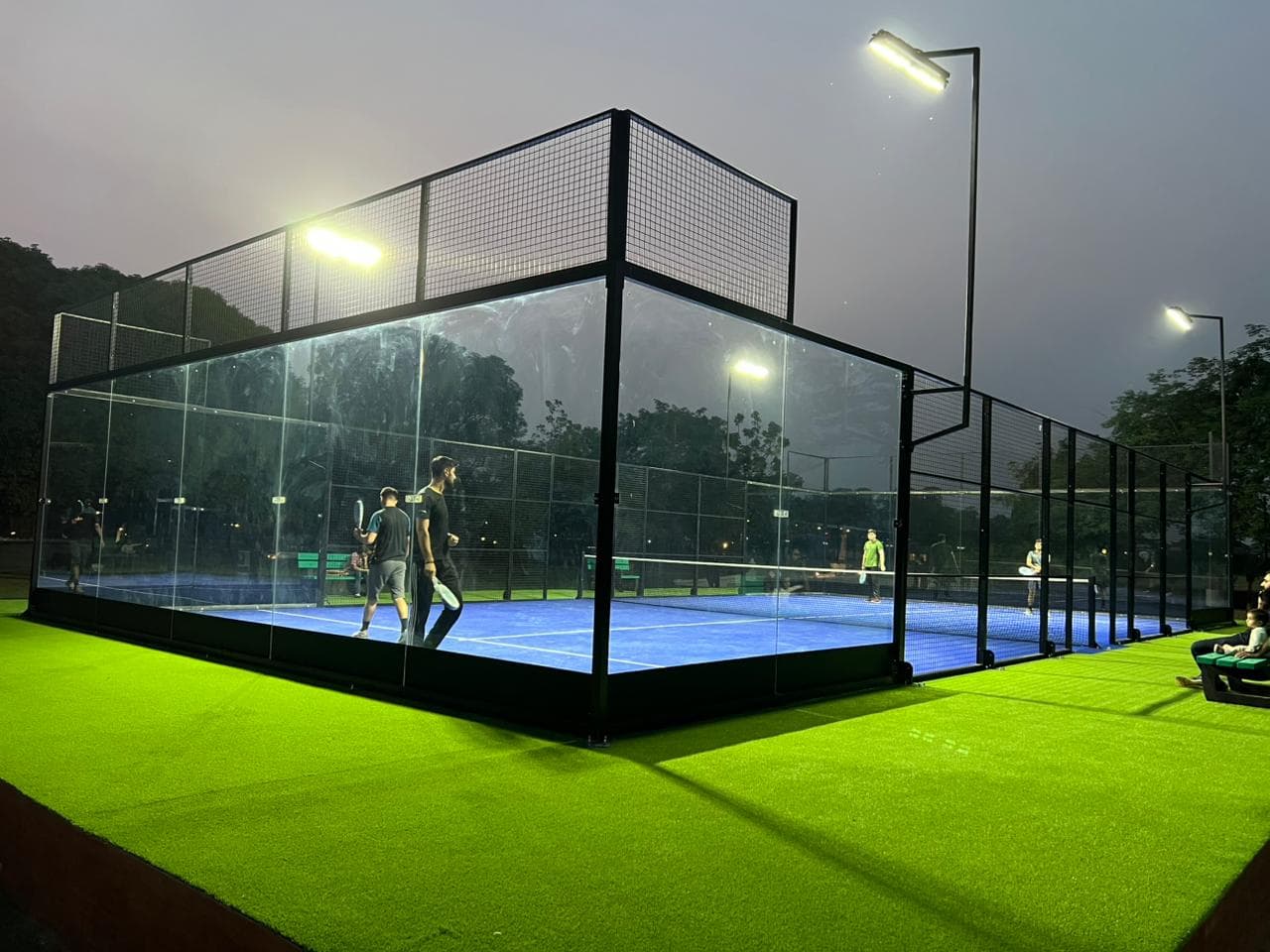 Padel court illuminated for night play